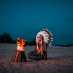 Young American Indian Woman against fire